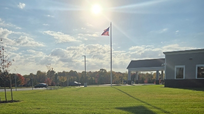 summer commercial landscaping blog grass and flagpole hawthorne property services near syracuse ny